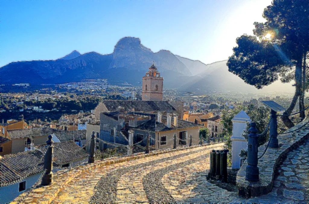 Vista artística en estilo óleo del casco antiguo de Polop con el monte Ponoch al fondo